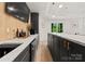 Gorgeous kitchen featuring a spacious island, pendant lighting, and a breakfast nook at 200 Royalton Pl, Huntersville, NC 28078