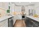 Modern kitchen features stainless steel appliances, custom cabinets, and quartz countertop at 200 Royalton Pl, Huntersville, NC 28078