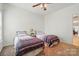 Charming bedroom featuring neutral walls, carpet, ceiling fan and two beds, offering a serene retreat at 212 Kilborne Rd, Mooresville, NC 28117