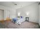 Bedroom featuring a ceiling fan, soft carpet, and two bedside tables at 212 Kilborne Rd, Mooresville, NC 28117