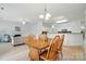Bright dining area flowing into the kitchen and living room, perfect for entertaining guests at 212 Kilborne Rd, Mooresville, NC 28117