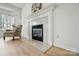 Classic fireplace with decorative mantle, adding a touch of elegance to the living room at 212 Kilborne Rd, Mooresville, NC 28117
