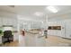 Spacious open kitchen featuring granite counters, white cabinets, and modern appliances at 212 Kilborne Rd, Mooresville, NC 28117