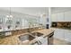 Bright kitchen with granite counters, stainless steel appliances, and a view to the living area at 212 Kilborne Rd, Mooresville, NC 28117