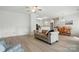 Spacious living area with a seamless flow between the living room, dining area, and kitchen at 212 Kilborne Rd, Mooresville, NC 28117