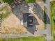 An aerial view of a home featuring great surrounding landscape and mature trees at 215 Scout Rd, Locust, NC 28097