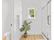 Bright bathroom features a glass enclosed shower, a window letting in natural light, and neutral fixtures at 215 Scout Rd, Locust, NC 28097