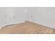 Spacious bedroom with luxury vinyl plank flooring and a closet at 215 Scout Rd, Locust, NC 28097