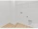 Walk-in closet featuring durable laminate flooring and wire shelving at 215 Scout Rd, Locust, NC 28097