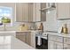 Well-equipped kitchen with modern appliances and white subway tile backsplash at 215 Scout Rd, Locust, NC 28097