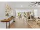 Bright open-concept living room and kitchen with hardwood floors and modern decor at 215 Scout Rd, Locust, NC 28097