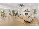 Open-concept living room and kitchen offers plenty of natural light and space at 215 Scout Rd, Locust, NC 28097