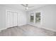 Bright bedroom with ceiling fan, closet and natural light provided by two windows at 221 Palmer St, Albemarle, NC 28001