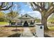 Charming home featuring covered porch with black railings and a well-maintained lawn at 221 Palmer St, Albemarle, NC 28001