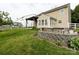 Spacious backyard with patio, fire pit, and lush lawn at 2316 Highland Park Dr, Charlotte, NC 28269