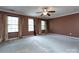Large primary bedroom with multiple windows providing plenty of natural light at 2316 Highland Park Dr, Charlotte, NC 28269