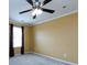 Cozy bedroom with neutral walls, ceiling fan and carpet at 2316 Highland Park Dr, Charlotte, NC 28269