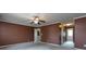 Bedroom featuring a neutral color palette and doorway to another room at 2316 Highland Park Dr, Charlotte, NC 28269