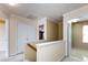 Upstairs hallway with natural light and neutral paint at 2316 Highland Park Dr, Charlotte, NC 28269