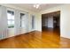 Bright sunroom featuring hardwood floors and access to the backyard at 2316 Highland Park Dr, Charlotte, NC 28269