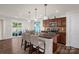 Modern kitchen with granite countertops, stainless steel appliances, and a large island with seating at 3119 Auten Ave, Charlotte, NC 28269