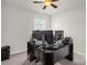 Well-lit office space with a window and multiple computer monitors on a desk at 3119 Auten Ave, Charlotte, NC 28269