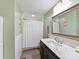 Well-lit bathroom with single sink vanity and shower-tub combo at 3232 Kale Ln, Matthews, NC 28105
