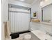 Bright white bathroom with a shower-tub combination at 3232 Kale Ln, Matthews, NC 28105