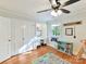 Bright bedroom features a built-in desk and hardwood floors at 3232 Kale Ln, Matthews, NC 28105