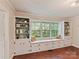 Charming built-in shelving with a cozy window seat offering natural light and storage in the room at 3232 Kale Ln, Matthews, NC 28105