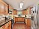 Modern kitchen featuring stainless steel appliances, sleek countertops, and ample cabinet space at 3232 Kale Ln, Matthews, NC 28105