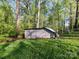 A shed or outbuilding provides extra storage space and adds to the property's functionality at 3232 Kale Ln, Matthews, NC 28105