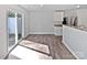 Bright breakfast area with wood floors, natural light, and a seamless transition to the outdoors at 3357 Ellingford Rd, Charlotte, NC 28214