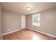 Bright bedroom featuring a window with natural light and laminate flooring at 390 15Th Ne Ave, Hickory, NC 28601