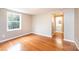 Cozy bedroom with hardwood floors and access to a bathroom at 390 15Th Ne Ave, Hickory, NC 28601