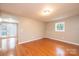 Cozy bedroom featuring wood floors, offering an inviting atmosphere at 390 15Th Ne Ave, Hickory, NC 28601