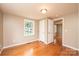 Bedroom with hardwood floors, a closet, and natural light at 390 15Th Ne Ave, Hickory, NC 28601