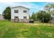 Exterior view of the home and backyard with an area for recreation at 390 15Th Ne Ave, Hickory, NC 28601