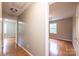 Inviting hallway showcasing hardwood floors and neutral wall paint at 390 15Th Ne Ave, Hickory, NC 28601