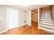 Open living space featuring hardwood floors and a staircase at 390 15Th Ne Ave, Hickory, NC 28601