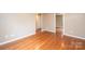 Spacious living room with hardwood floors and neutral paint, offering a warm and inviting atmosphere at 390 15Th Ne Ave, Hickory, NC 28601