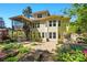 Back of house with deck and spiral staircase at 404 Brookridge Dr, Mount Holly, NC 28120
