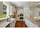 Well-equipped kitchen with stainless steel appliances, granite countertops, and stylish cabinetry at 404 Brookridge Dr, Mount Holly, NC 28120