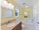 Bathroom featuring a soaking tub, vanity and large mirror at 4143 Tullock Creek Dr, Charlotte, NC 28269