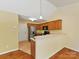 Well-lit kitchen featuring stainless steel appliances and light wood cabinets at 4143 Tullock Creek Dr, Charlotte, NC 28269