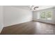 Sunlit room with wood floors, large windows, and baseboard molding at 4219 Shasta Cir, Clover, SC 29710