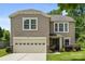 Charming two-story home with a well-manicured lawn, neutral siding, and a two-car garage, creating a welcoming curb appeal at 4219 Shasta Cir, Clover, SC 29710