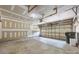 Spacious garage with ample storage space, featuring an automatic door and concrete floor for convenient parking at 4219 Shasta Cir, Clover, SC 29710