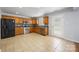 Modern kitchen featuring stainless steel appliances, tile flooring, and access to the backyard at 4219 Shasta Cir, Clover, SC 29710