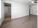 Living room with vinyl flooring, view of the bathroom, and natural light at 4219 Shasta Cir, Clover, SC 29710